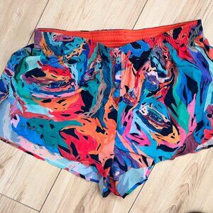 Janji 2" AFO Split Shorts, women's size large, like new